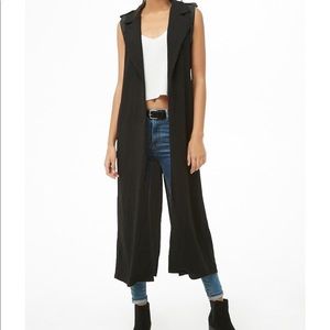 Longline vest with faux leather shoulder trimming